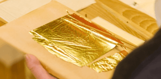 A gold leaf workshop, showcasing a thin gold sheet you use for the craft